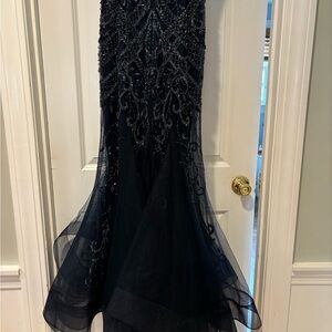 I am 5 foot 4 1/2 inches and dressed was perfect length for 1 to 4 inch heels.